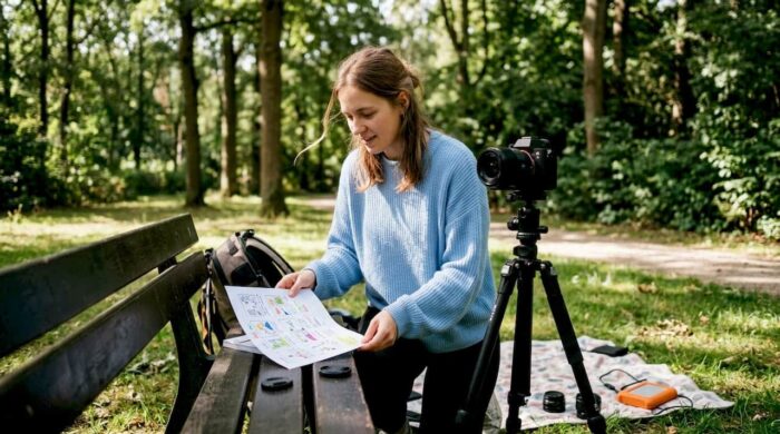 Videographer preparing cinematic storytelling equipment