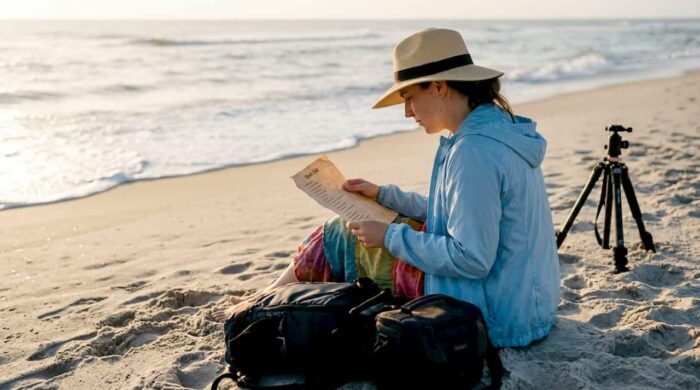 Photographer planning outdoor shoot at sunrise